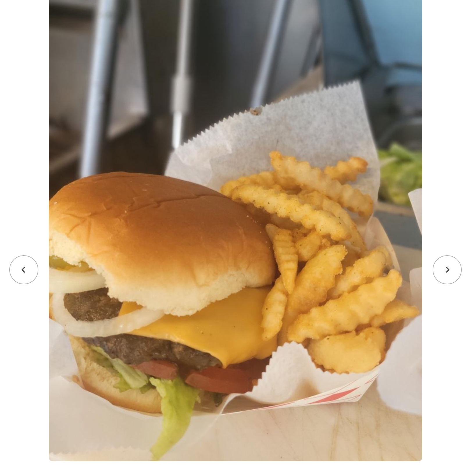 Quarter Pound Deluxe Burger + 3 Wings any flavor